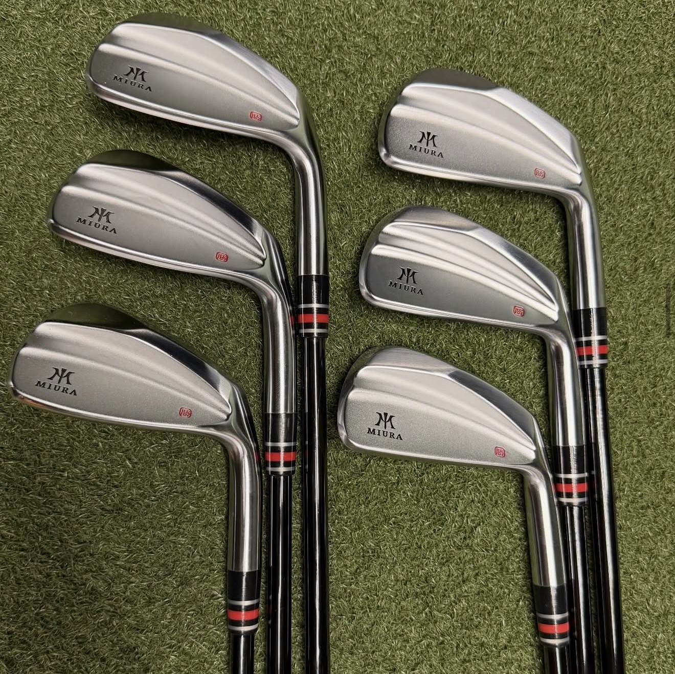 Miura irons with custom red and black ferrules
